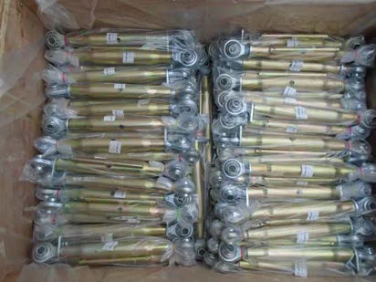 Yellow zinc-plated top links packed for export