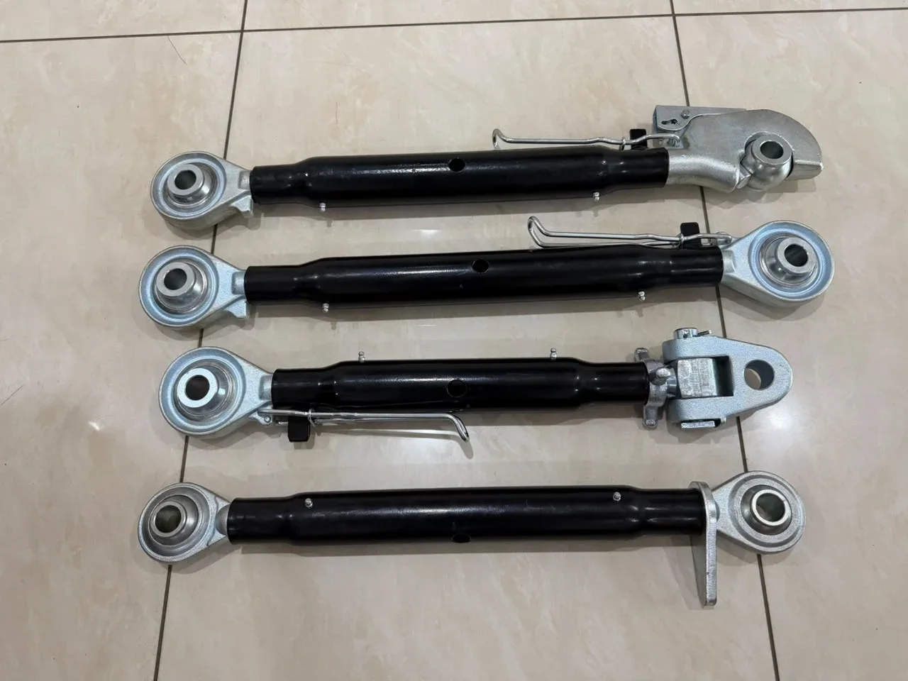 Top links with quick hitch hook ends, ball joint ends and locking handles