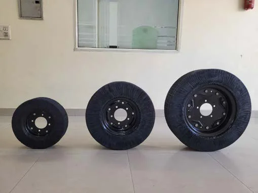 Laminated tyre wheels for rotary cutters in three sizes